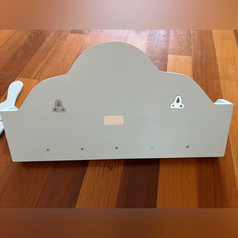Adorable wooden shelf w/ hangers for baby room
